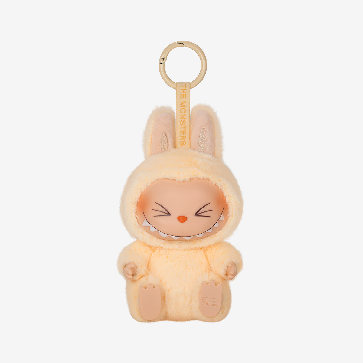 Plush keychain in the shape of a cartoon character with a neutral expression on a white background