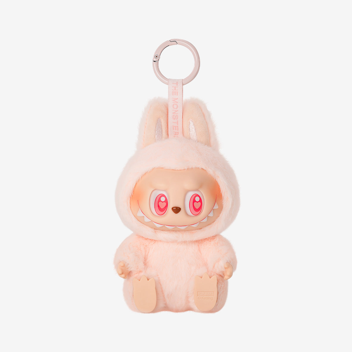 Plush keychain with a cute character design on a white background
